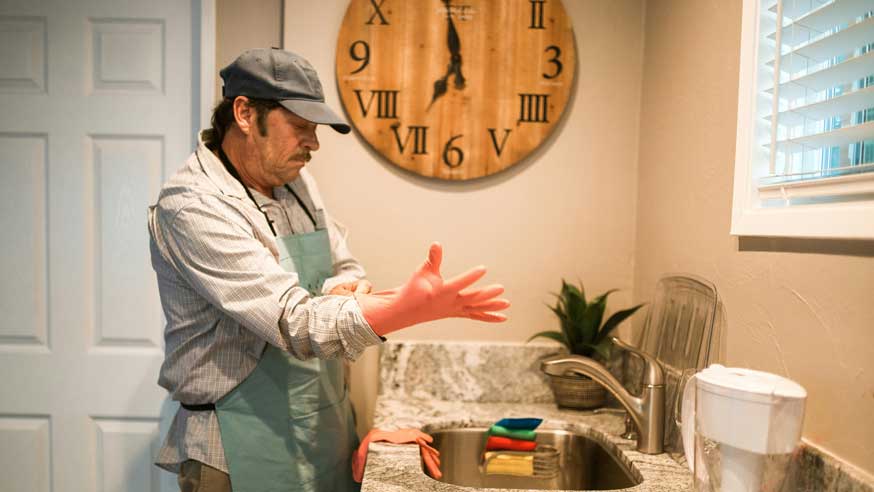 Man cleaning productive housework